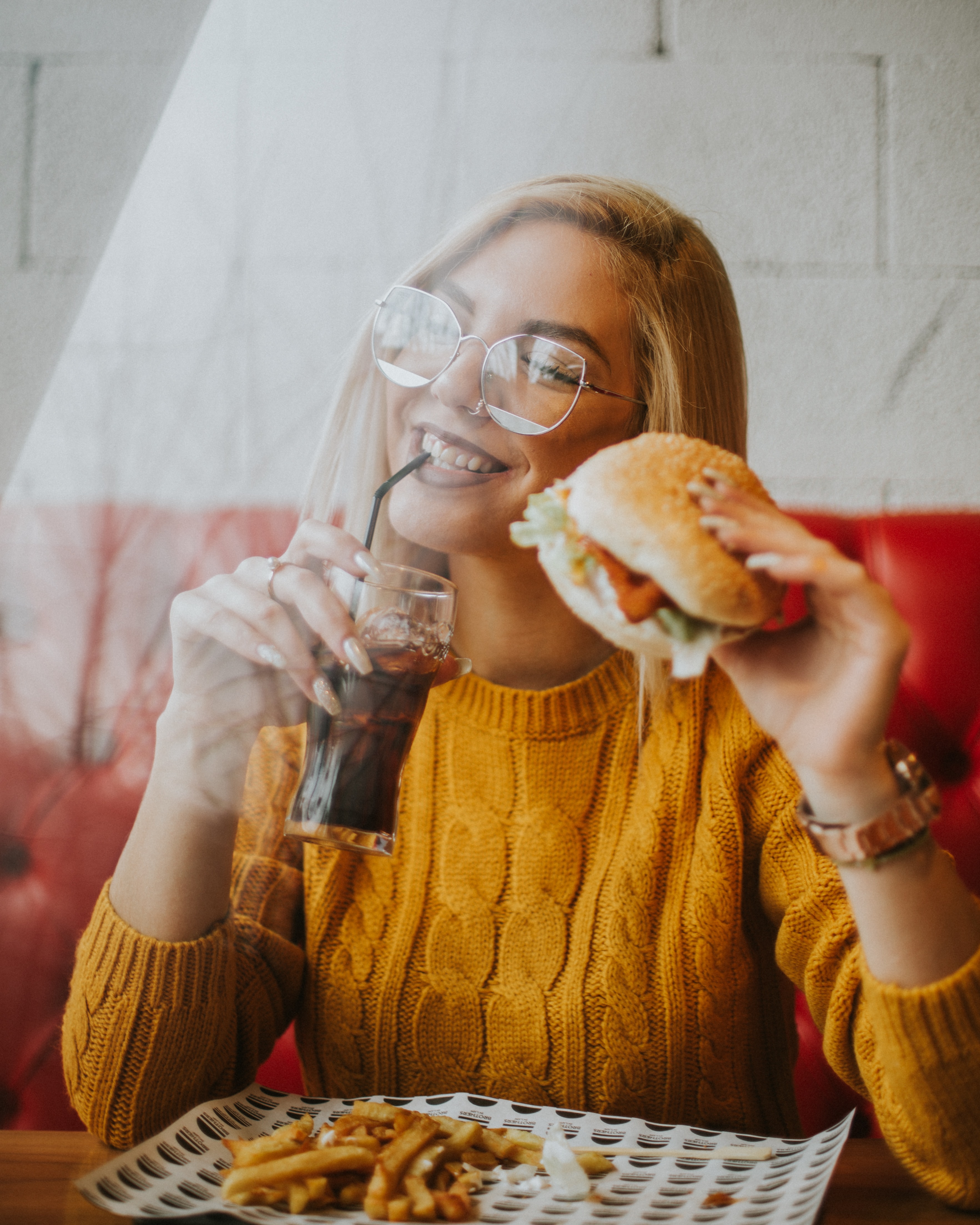 new year resolution treat burger junk food happy girl coke burger and fries