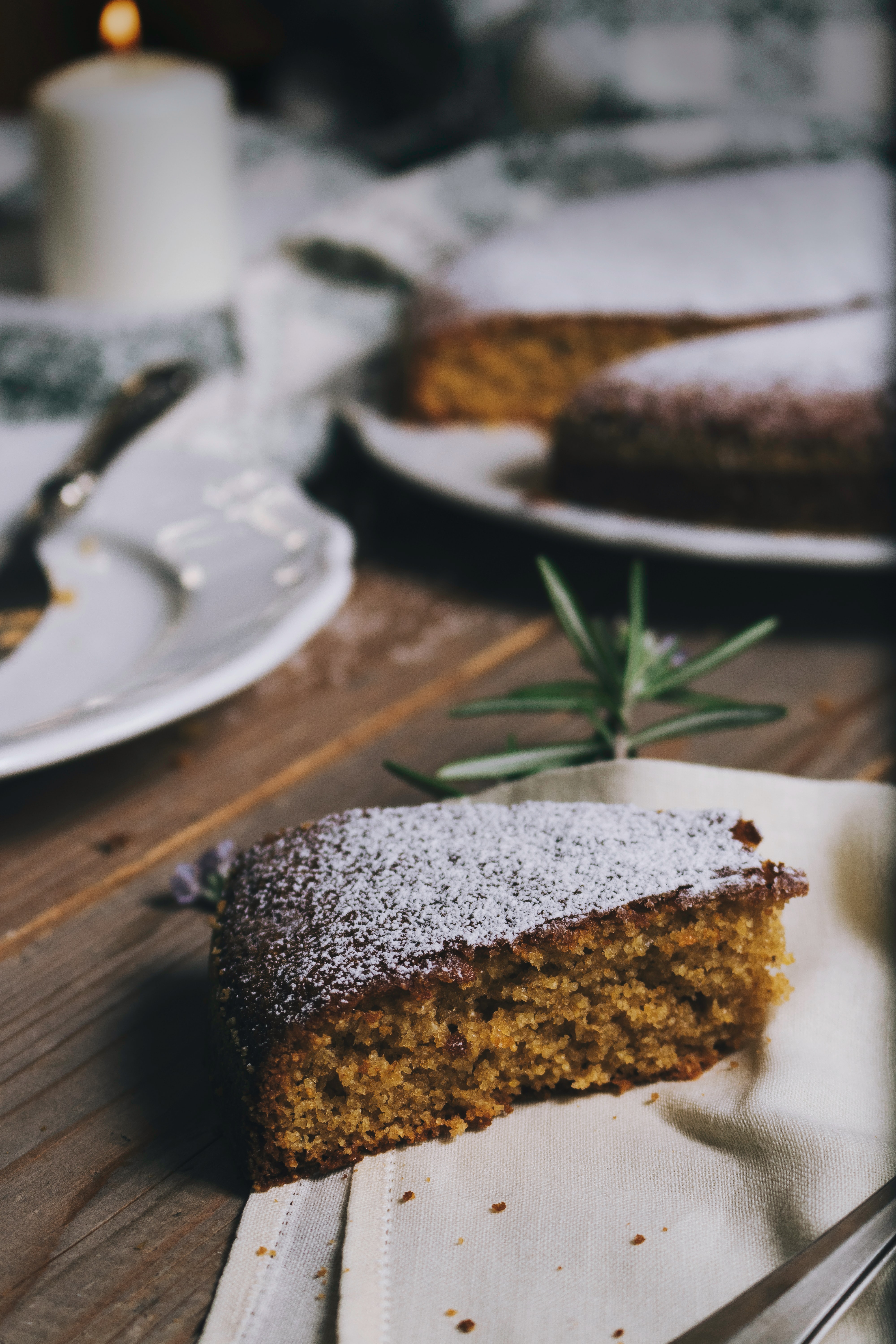 Greek vasilopitta pirncely pie tradition orange sponge cake hidden coin new years cake slice of cake on table